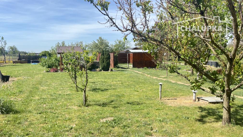 2-izbový byt 82 m2 so záhradou 342 m2, garážou a hosp. časťou, Kostolná-Záriečie pri Trenčíne